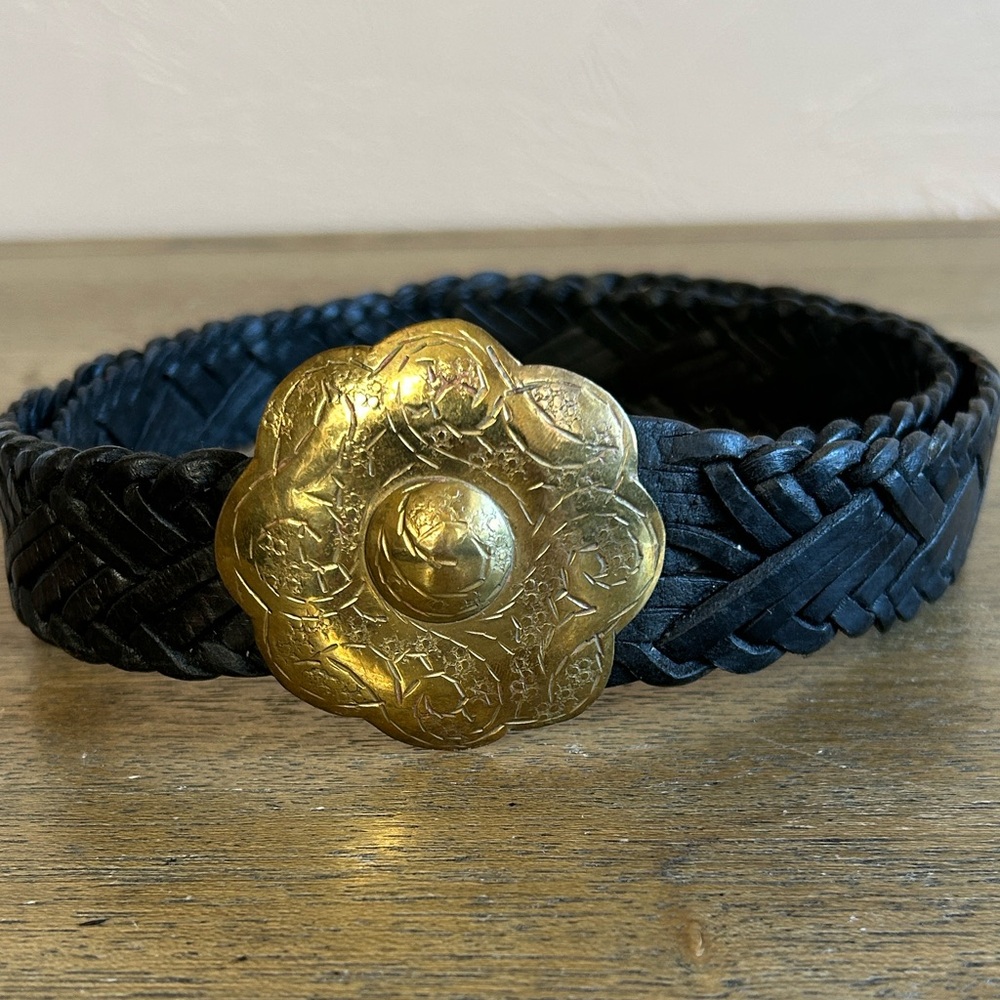 Vintage Boho Braided Leather Belt with Decorative Hammered Brass Floral Buckle.